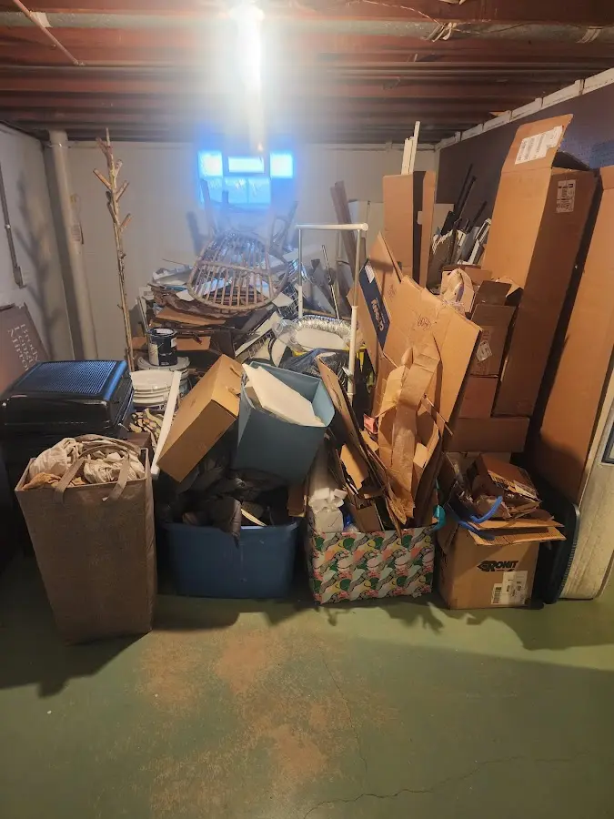 Roll-off dumpster container at job site for 2 Yard Dumpster Rental in Deerfield Beach